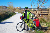 cycling tourist cyclist in Ribarroja Turia with paniers