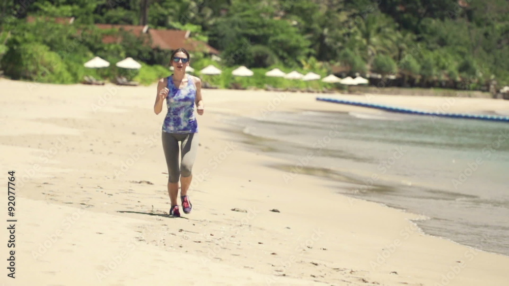 Woman running on beautiful beach, super slow motion, shot at 480fps
Woman running on beautiful beach, super slow motion, shot at 480fps