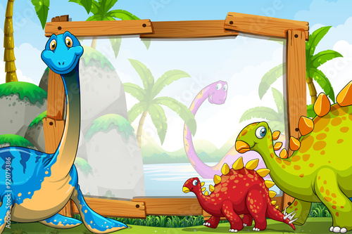 Dinosaurs around the wooden frame