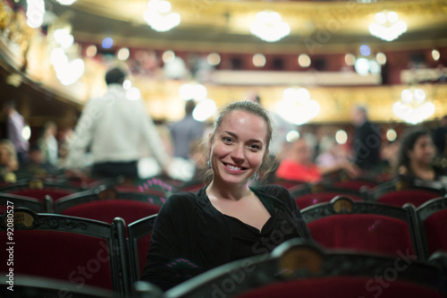 Woman in auditorium of teatre © JackF