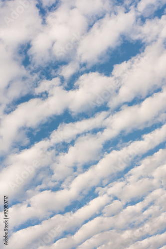 Cirrocumulus clouds in the sky - Dense fluffy cirrocumulus clouds formation against the blue sky.