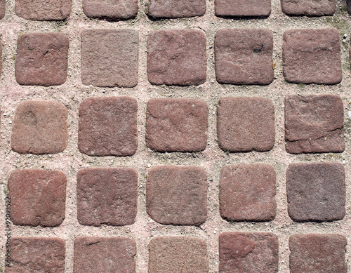 Small brown paves with pink joints
