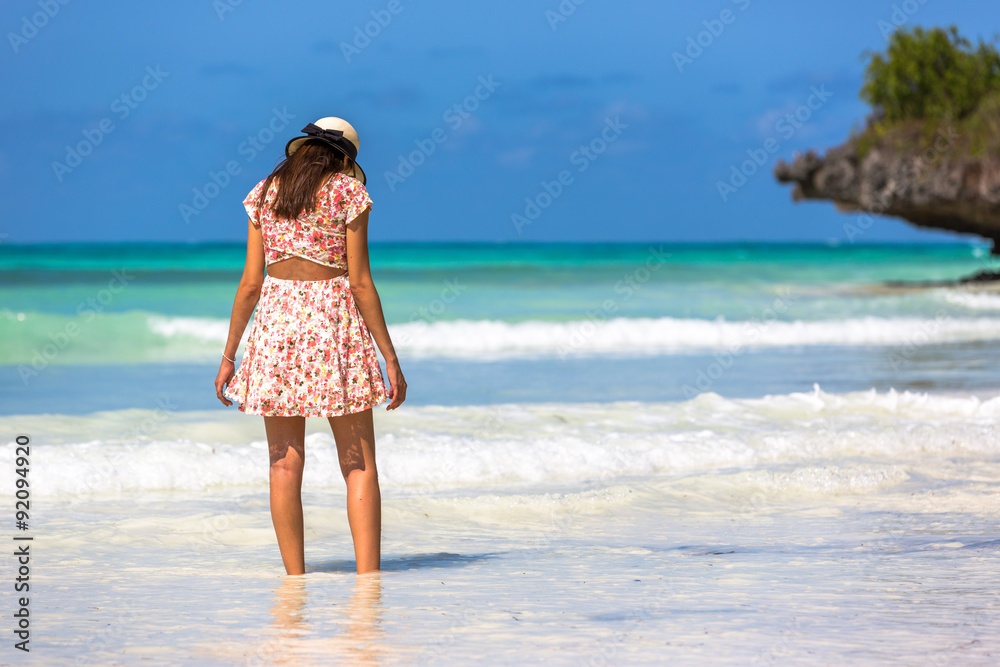 Young woman enjoy a beautiful view in Zanzibar, Tanzania, Africa