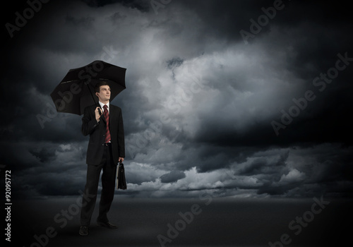 Businessman with umbrella