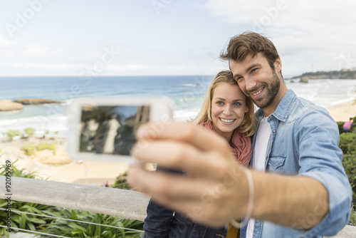 couple making selfie photo