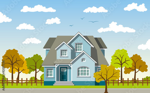 Classic Cottage in the autumn landscape