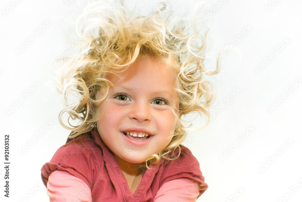 surprised cute little girl with curly hair . age 4 surprised cute little girl with curly hair . age 4