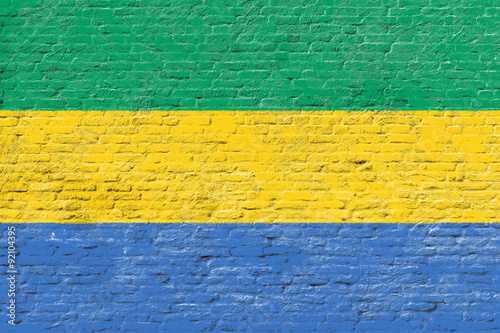 Gabon - National flag on Brick wall