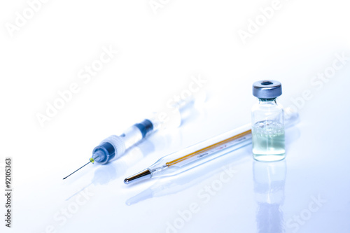 Syringe, medical injection wint bottle and thermometer