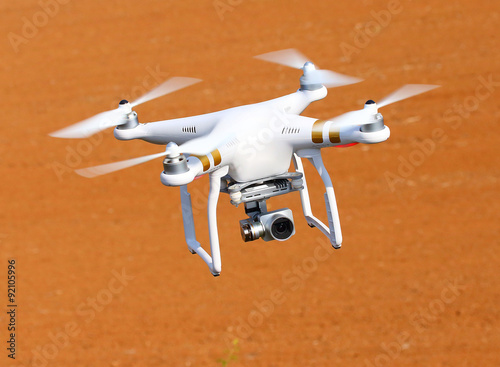 Drone quadrocopter with high resolution digital camera. New tool for aerial photo and video. 