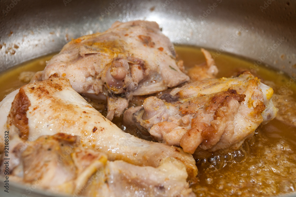 Frying chicken meat in deep hot oil Frying chicken meat in deep hot oil