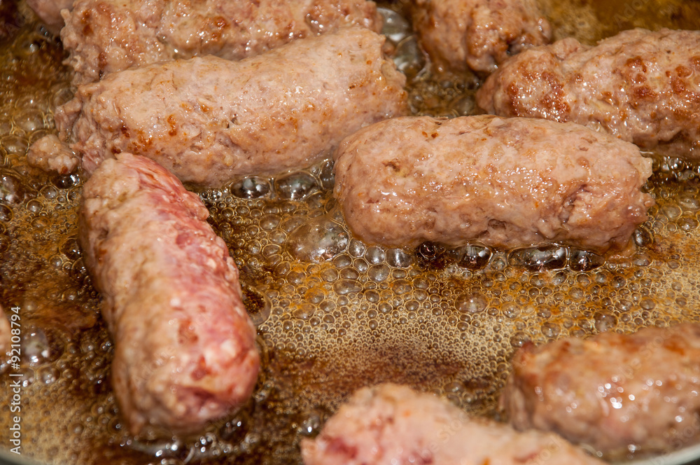 Frying turkish kebabs in the deep hot oil Frying turkish kebabs in the deep hot oil