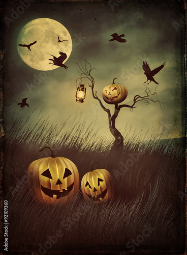 Pumpkin scarecrow in fields at night with vintage look