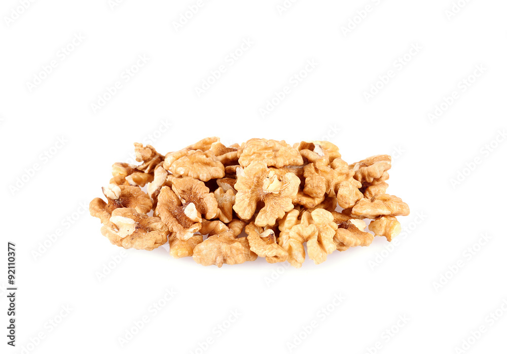 Pile of walnut kernels isolated on white Pile of walnut kernels isolated on white