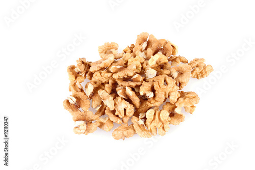 Pile of walnut kernels isolated on white