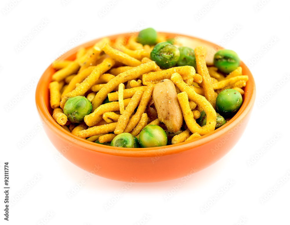 Isolated bowl of Indian bhuja snack on white Isolated bowl of Indian bhuja snack on white