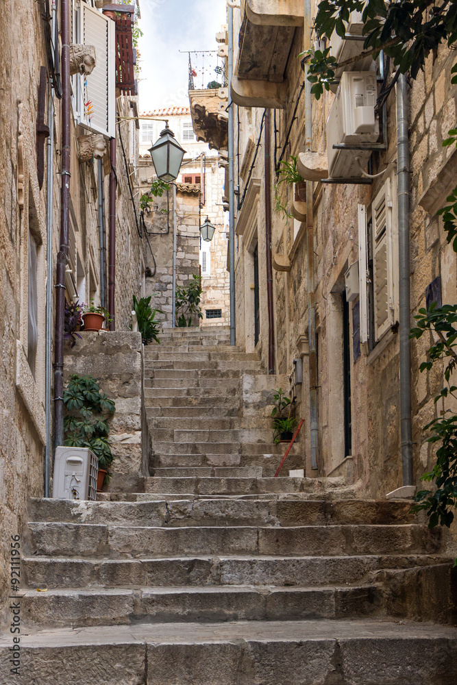 Narrow and empty alley and stairs at the Old Town in Dubrovnik, Croatia.