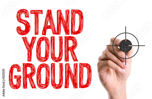 Fotografie Hand with marker writing: Stand Your Ground