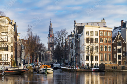 Photography Beautiful winter view on the Groenburgwal and the Southern church in Amsterdam, the Netherlands
