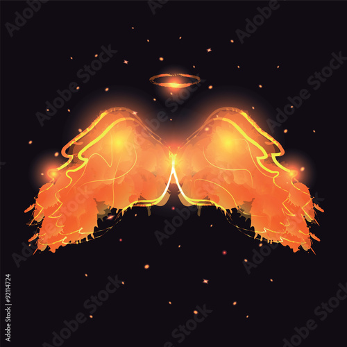 Angel nimbus and wings on black background.