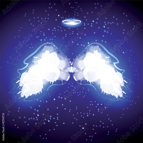 Angel nimbus and wings on black background.