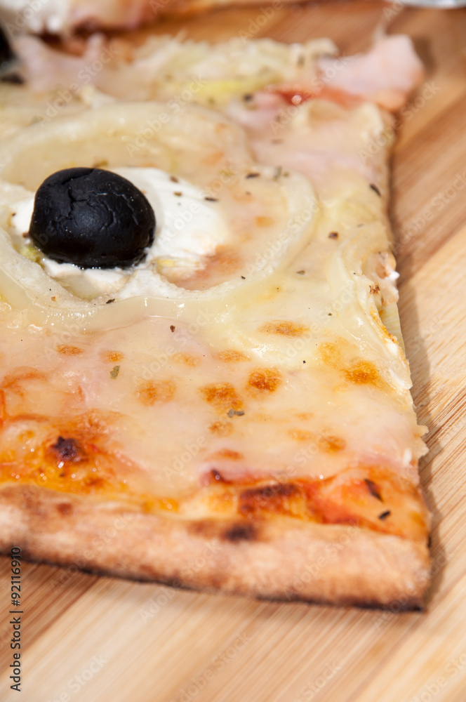 Slice of pizza with black olives Slice of pizza with black olives