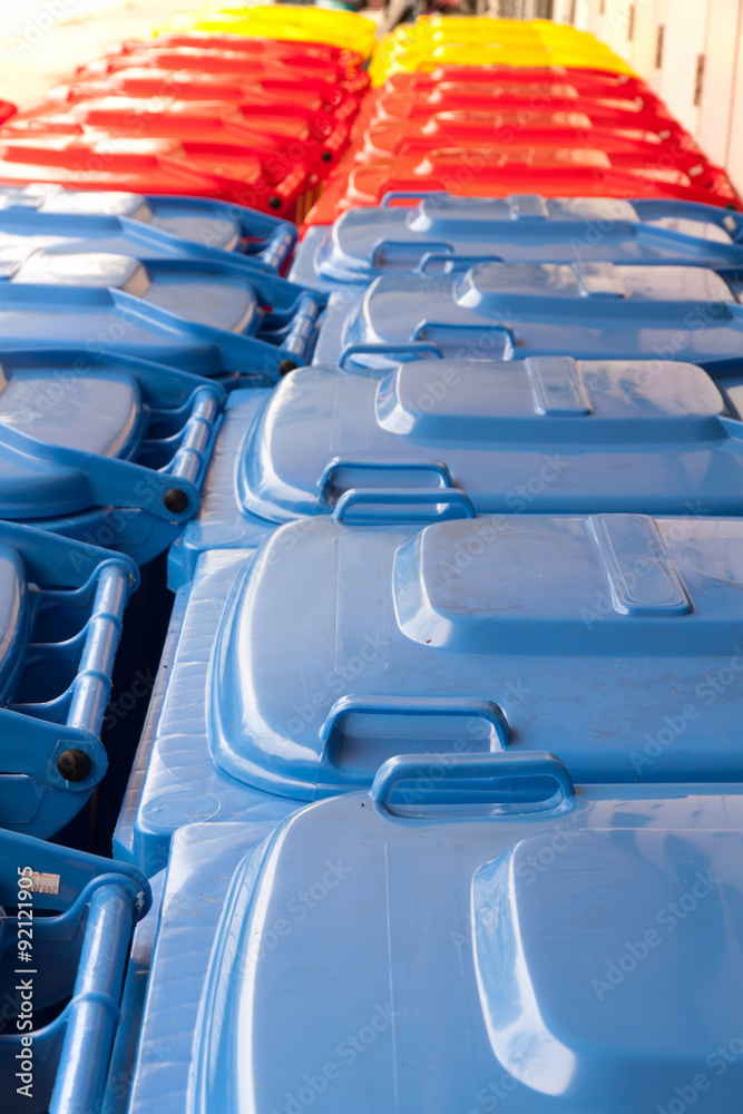 Fototapeta premium blue red yellow bins