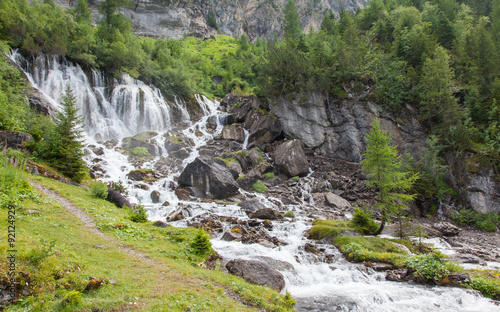 Waterfall in the forest photo