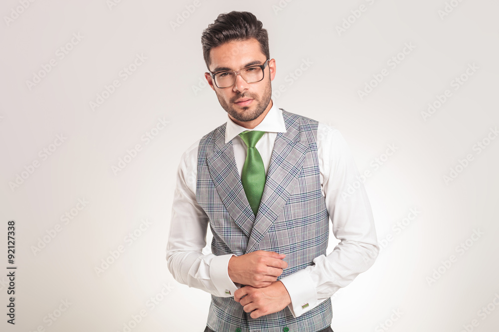 elegant young business man looking at the camera elegant young business man looking at the camera