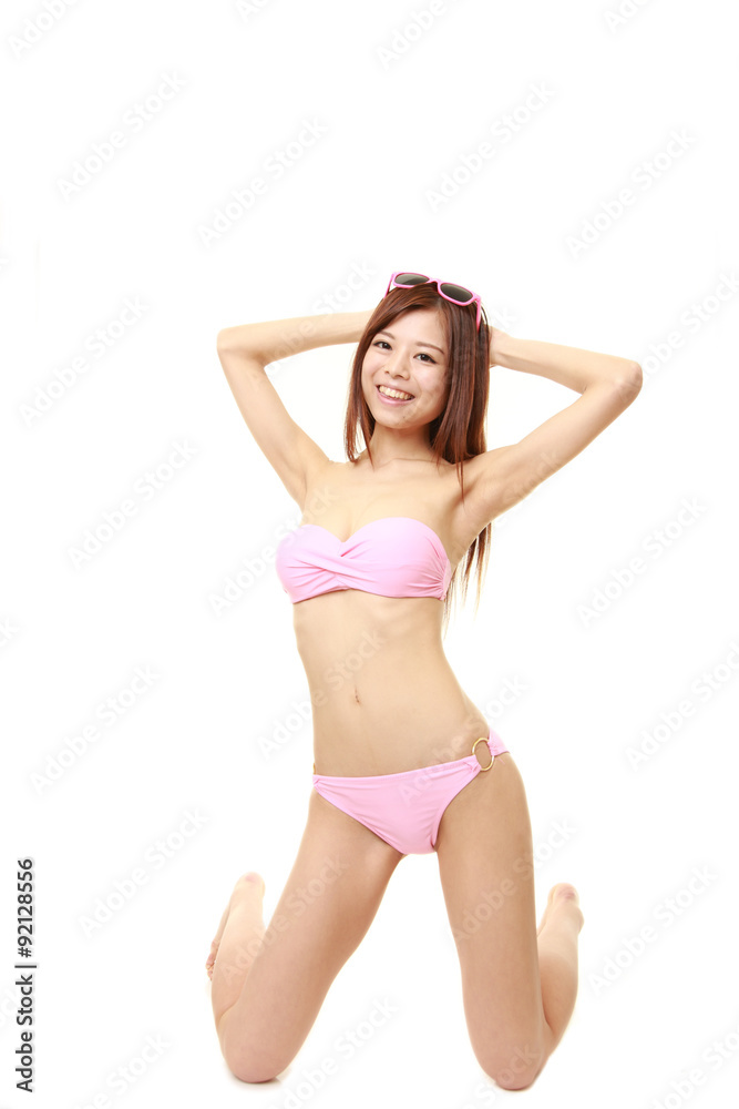 Japanese woman posing in a pink bikini Japanese woman posing in a pink bikini