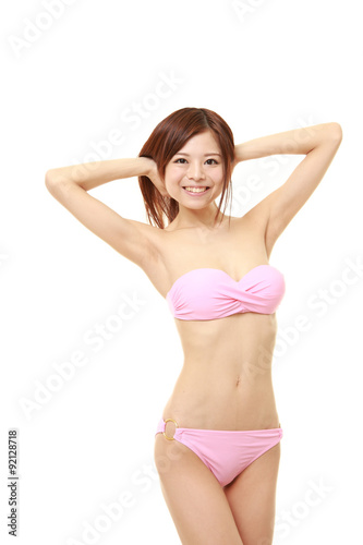 Japanese woman posing in a pink bikini © jedi-master