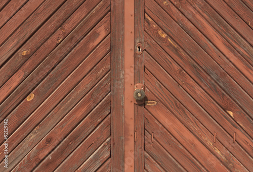 Old locked wooden door.