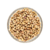 Top view of Organic  Dried coriander seeds (Coriandrum sativum) in glass bowl isolated on white background.