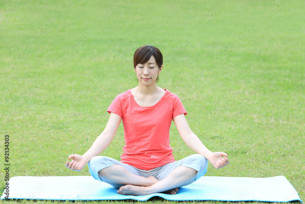 Japanese woman doing meditation Japanese woman doing meditation