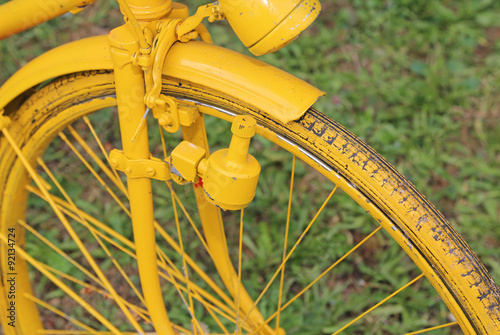 Photography old bicycle with the bottle dynamo on the front wheel