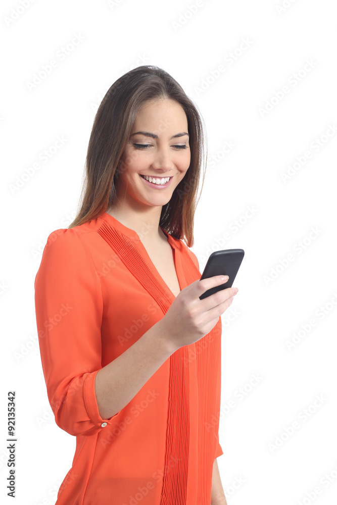 Woman wearing an orange shirt using a mobile phone Woman wearing an orange shirt using a mobile phone