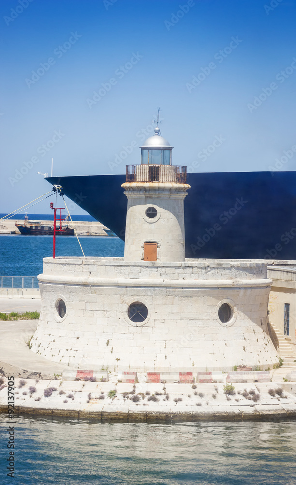 ancient watchtower in front of the ship's hull