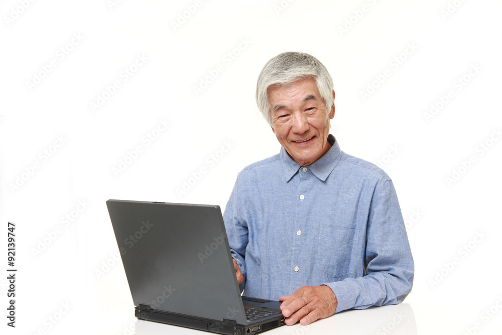 senior Japanese  man using laptop computer