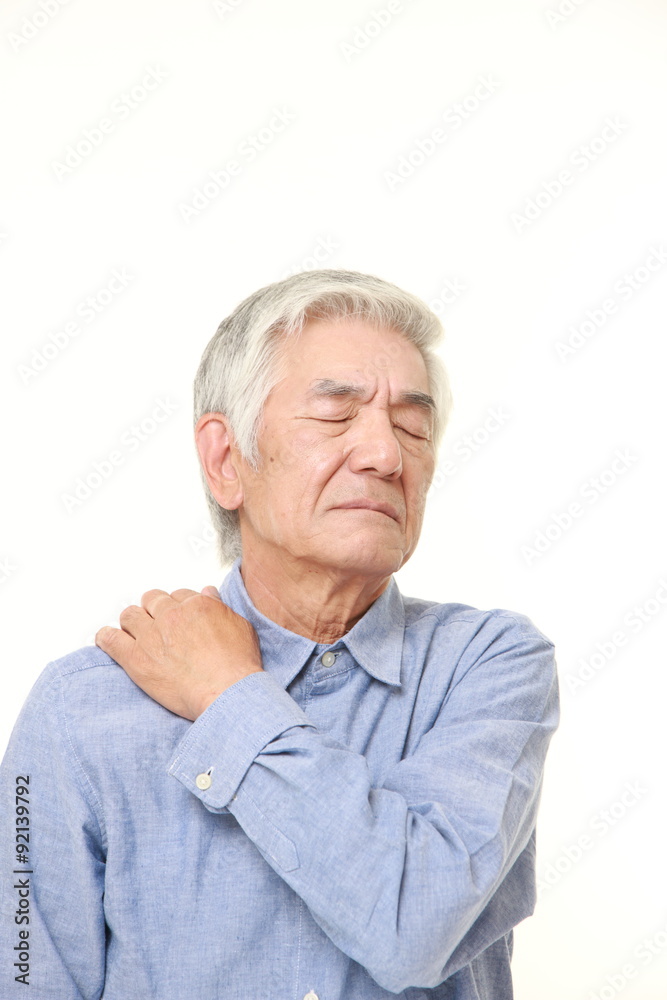 senior Japanese man suffers from neck ache senior Japanese man suffers from neck ache