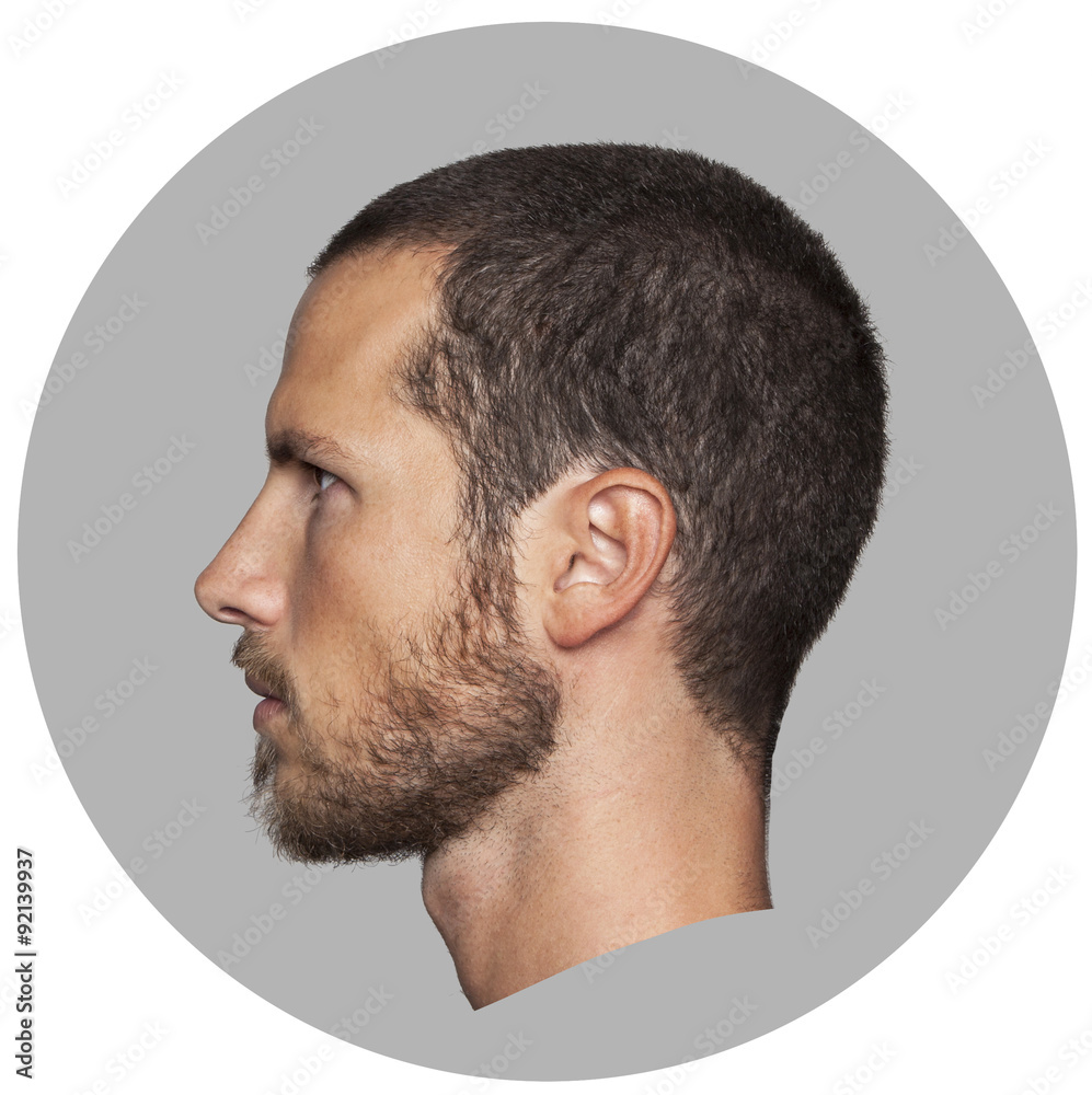 Obraz premium coin like portrait of an handsome young man profile