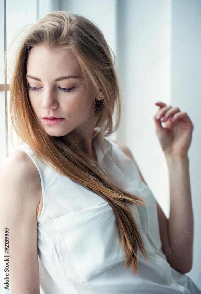 Fototapeta premium Young woman portrait. Shape and fit body beauty studio shoot