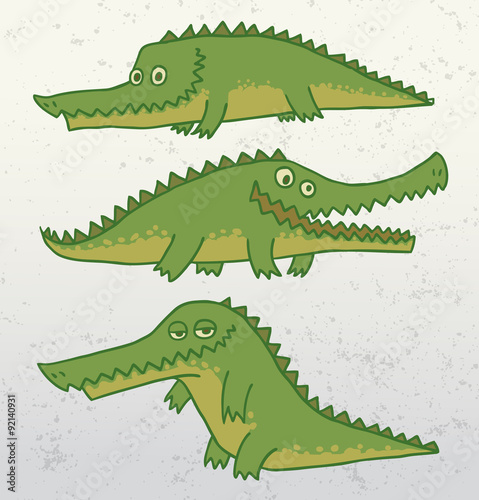 Vector funny crocodile set. Image of three funny crocodiles of green color in different poses on a gray background.