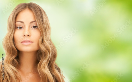 beautiful young woman face with long hair