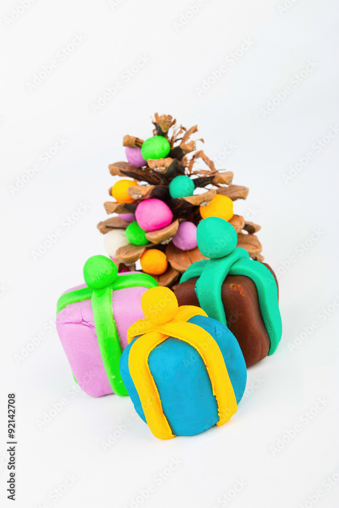 Fototapeta premium Pine cone and plasticine gift. Stock image macro.