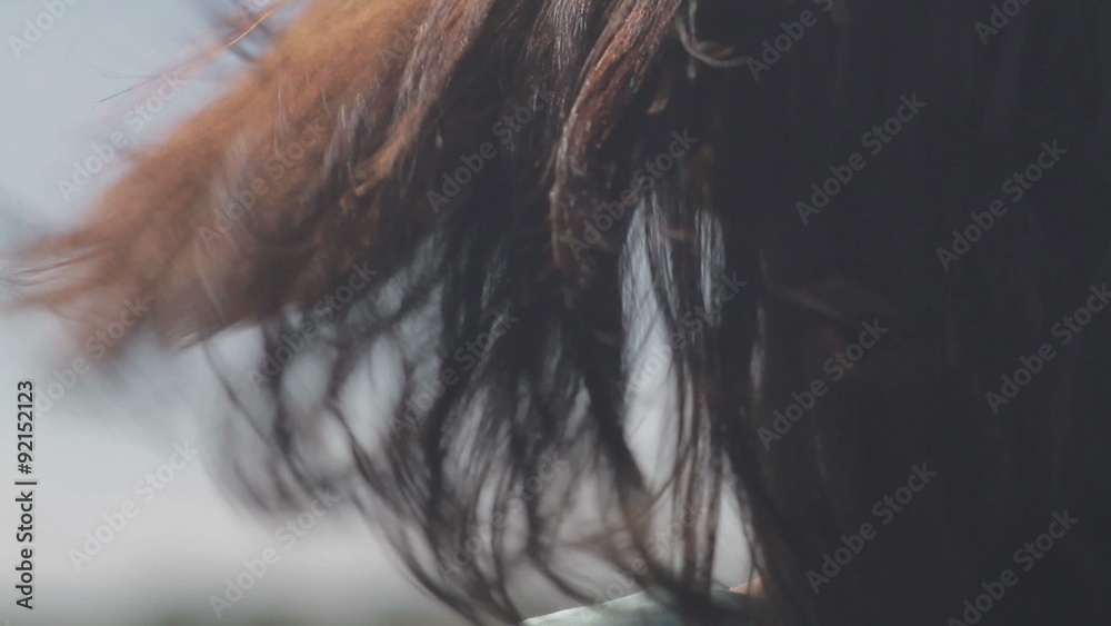 wind blowing woman's hair wind blowing woman's hair