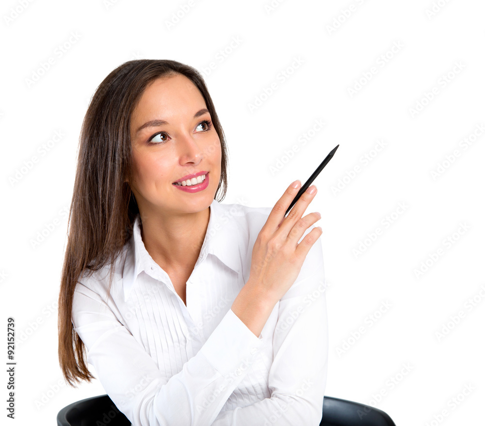 Beautiful young woman smiling sitting by table. Serene Asian Cau Beautiful young woman smiling sitting by table. Serene Asian Cau