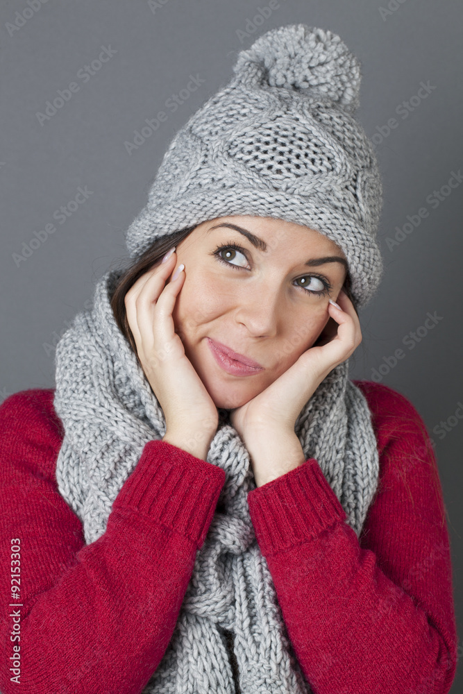 cheeky teenager smiling in thinking about winter seasonal greetings cheeky teenager smiling in thinking about winter seasonal greetings