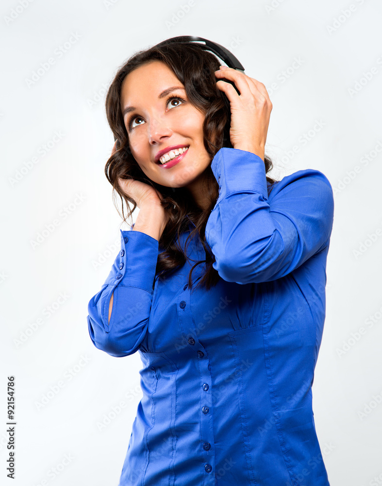 Young Happy Music woman isolated portrait. Female model studio i Young Happy Music woman isolated portrait. Female model studio i