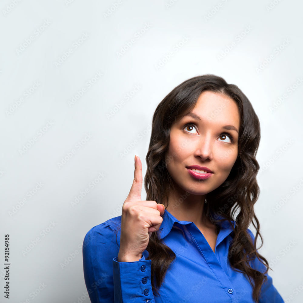 Woman copy space pointing finger. smiling business woman portrai Woman copy space pointing finger. smiling business woman portrai