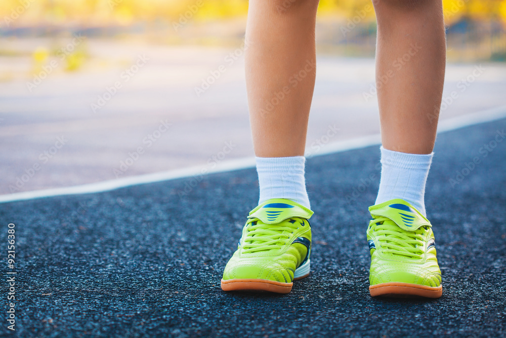 Runner's Feet Running on Stadium 